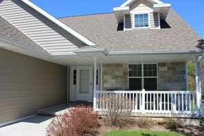 Front door and covered porch.