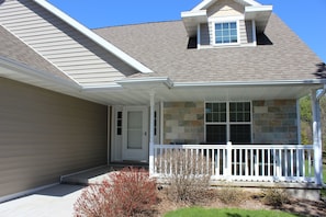 Front door and covered porch.
