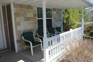 Covered porch for relaxing time.