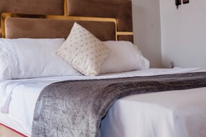 Cozy Double Bed with Plush Headboard – Ideal for Couples
