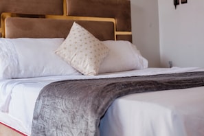 Cozy Double Bed with Plush Headboard – Ideal for Couples