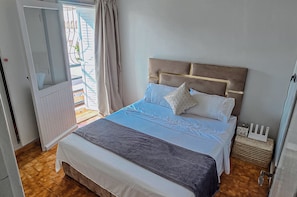 Sunny Bedroom with Closet & Private Balcony Access