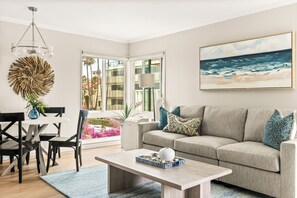 Soak in the coastal charm and natural light in the relaxing living area, designed for downtime.