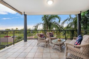 Kick back in the woven lounge setting, where morning coffee or an evening drink comes with swaying palms and the scent of sea air.