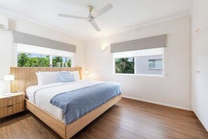 After a day by the sea, recharge in the primary bedroom with a king bed and a built-in wardrobe to keep your space organised.