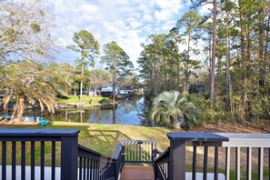 View of canal waterway from upstairs deck. A short kayak - boat ride to Bay.