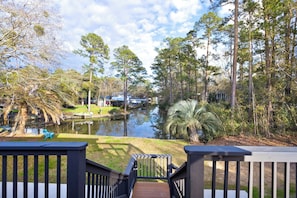 View of canal waterway from upstairs deck. A short kayak - boat ride to Bay.