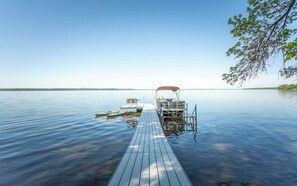 Private dock with paddle boards, lily pad, and optional pontoon rental.