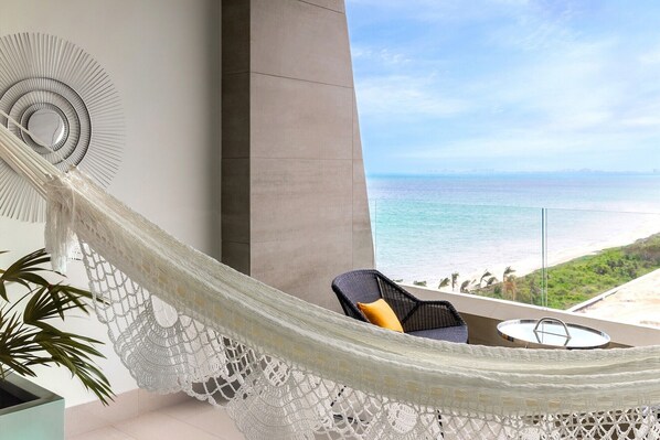 your private balcony with a hammock and a view