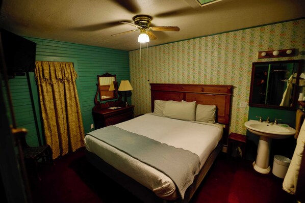 European style room with king bed