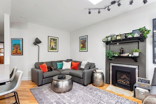 Inviting and relaxing space. Plush sofa and chaise in this open floor plan.  