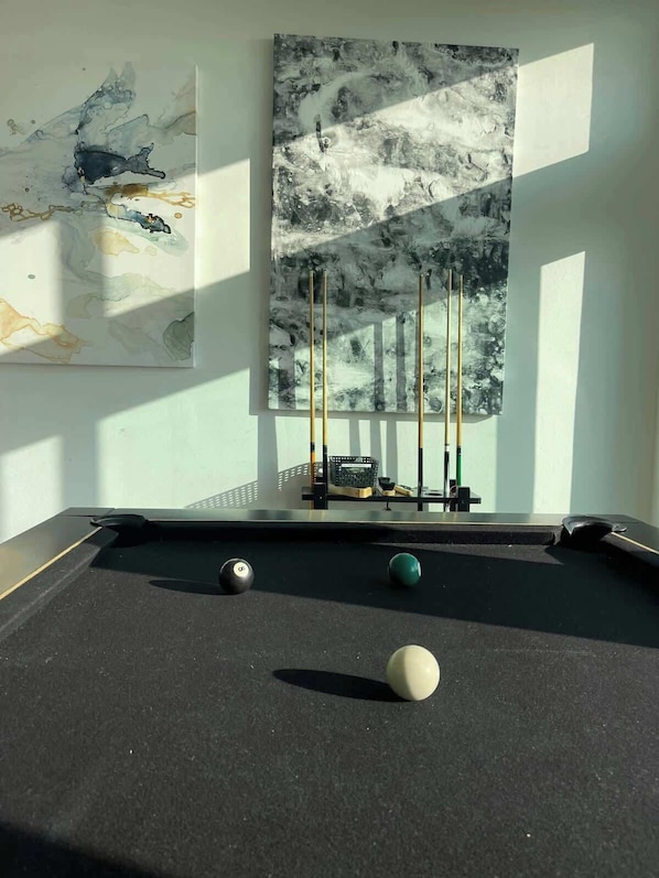 Pool table and foosball perfect for group gatherings