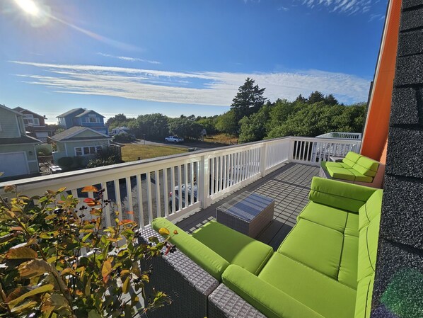Plush, over-sized deck chairs perfect for lounging to the roar of the ocean