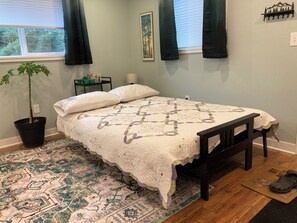 Futon couch makes into a queen bed.
