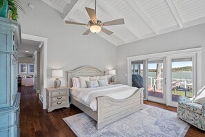 Primary bedroom suite with deck access.
