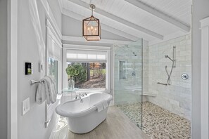 Primary bath with large window to enjoy the views.