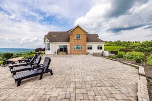 Massive Deck off the living room with plenty of sun loungers to absorb all the sunsets!