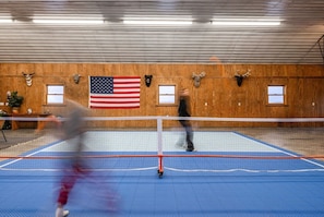 Challenge your friends and family to a fun and exhilarating game of pickleball in the indoor garage game room. We provide 4 paddles and some pickleballs so you can jump in on a game as soon as you arrive.