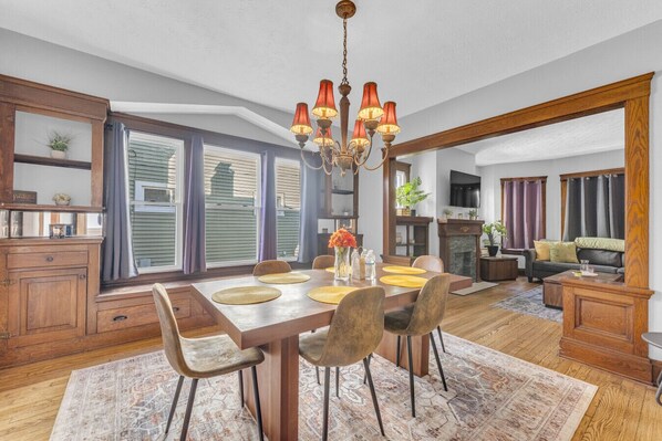 Gather ‘round the table where vintage charm meets modern comfort. From morning coffee chats to evening game nights, this space is made for connection.
