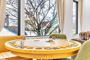Host a fun bachelorette party or sleek corporate retreat in this stylish game room, perfect for groups. Enjoy laughter and card games with stunning Nashville views! This vacation rental guarantees unforgettable fun and luxury!