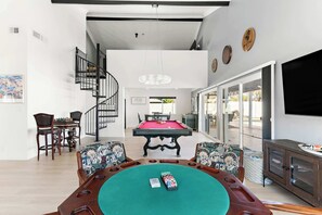 Game night awaits! Enjoy a pool table, poker table, and chess in a spacious open-floor game room.