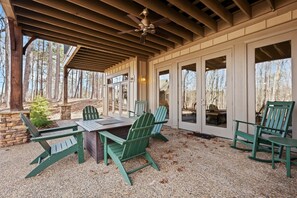 The perfect spot for stargazing and storytelling—firepit seating on the lower level.