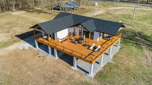 At home, enjoy luxury amenities for up to 6 guests in our newly built, 2-bedroom, 3-bathroom home, featuring a fully stocked kitchen and a cozy living room.