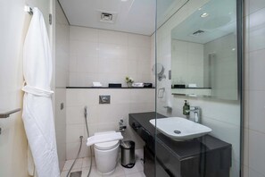 Sleek and clean bathroom space in apartment.