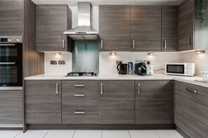 Kitchen/diner. Fully equipped with cooking equipment perfect for families. Appliances such as washer, fridge freezer, microwave, oven are free and available for your use. - Pool table available for relaxation