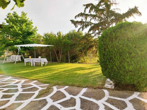Spacious garden with outdoor furniture