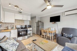 Relax in the living room with a smart tv and sofa sleeper!