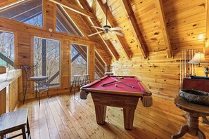 Unleash your competitive side with a round of pool in the loft!