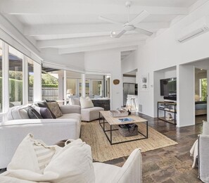 Living area with comfortable couches and open fireplace