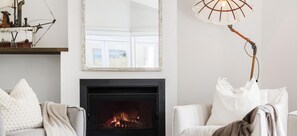 A cosy open fire in the heart of the home. A retreat suitable for any season!