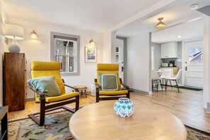 Unwind in the cozy living room & stream your favorites on the smart TV