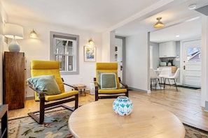 Unwind in the cozy living room & stream your favorites on the smart TV