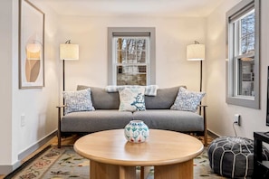 Unwind in the cozy living room & stream your favorites on the smart TV