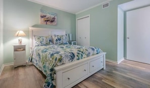 Drift into coastal dreams—this serene bedroom is your personal island escape, one peaceful night at a time.