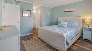This beautiful bedroom is the perfect place to unwind and recharge. The comfortable bed, ample storage space, and calming décor make it a true oasis.