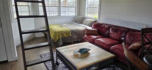 ladder to loft for the brave. loft has twin mattresses 