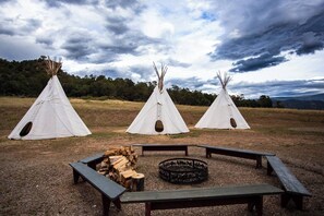 Camping Teepees with fire pit and wood provided