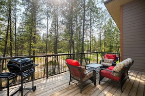 Private balcony/deck with outdoor seating and a BBQ on a fitted gas line for endless grilling possibilities.