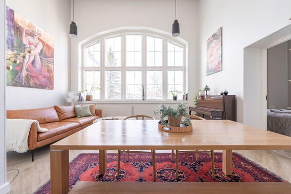 The apartment has previously served as the operating wing of a two- floor surgical operating room. The atelier windows, flooded with natural light, are a reminder of the period.