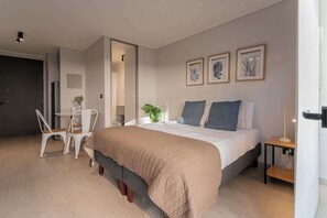 Cozy studio apartment with modern decor and natural light, perfect for a relaxing stay in Chile.
