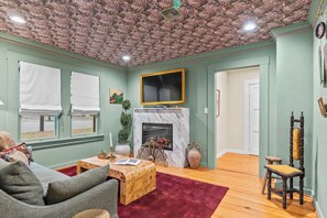Living room with electric fireplace and Smart TV