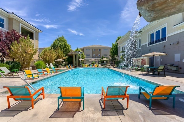 Soak up the sun at the resort-style pool—the perfect way to unwind after a day exploring Reno.