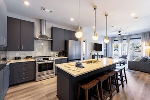 Modern design meets everyday convenience in this kitchen.