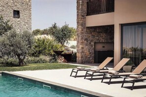 Sun loungers by the pool