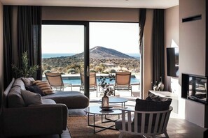 Living room with pool area access 