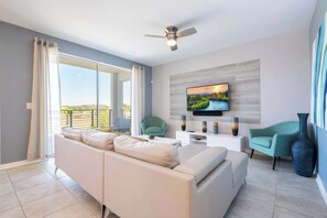 Movie nights, game days, or chill mornings 🌅 This open-concept living room brings the fam together—with comfy seating and a view worth posting.